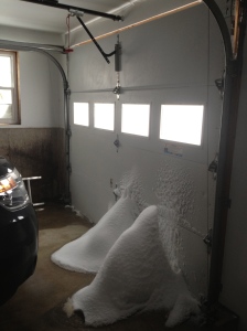 We aren't quite sure how this happened and how the garage door didn't close all the way but this is what we found when we initially went out to snow blow